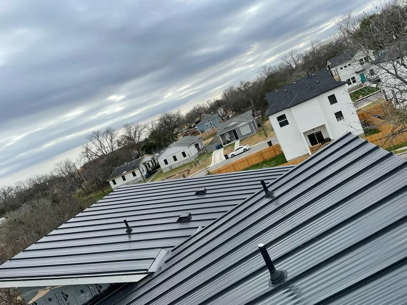 Standing seam metal roof panels with vents for Skylight Repair in Benton Park